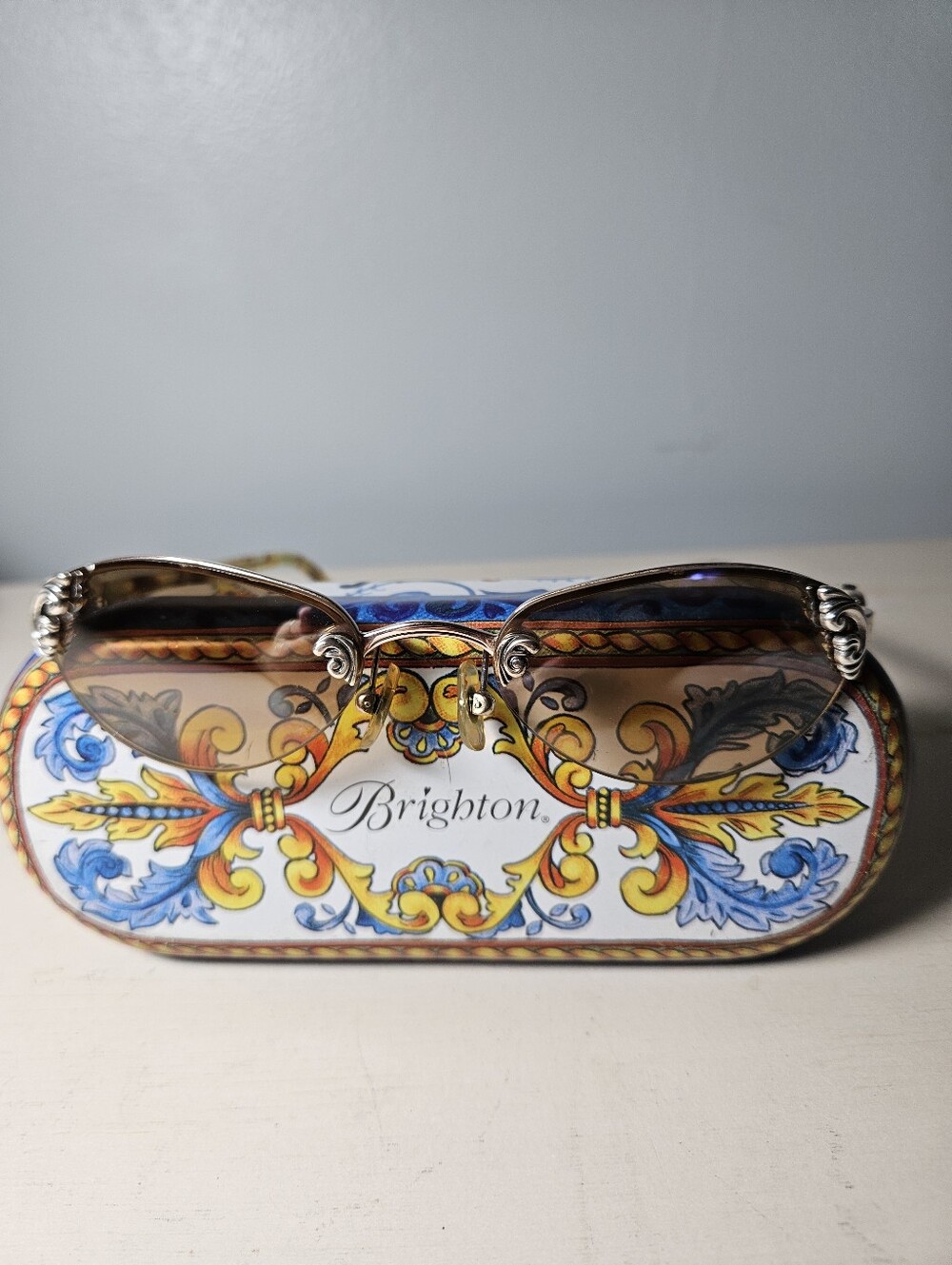Brighton "Beautiful Mind" Vintage Rimless Sunglasses with Graphic Tin Case